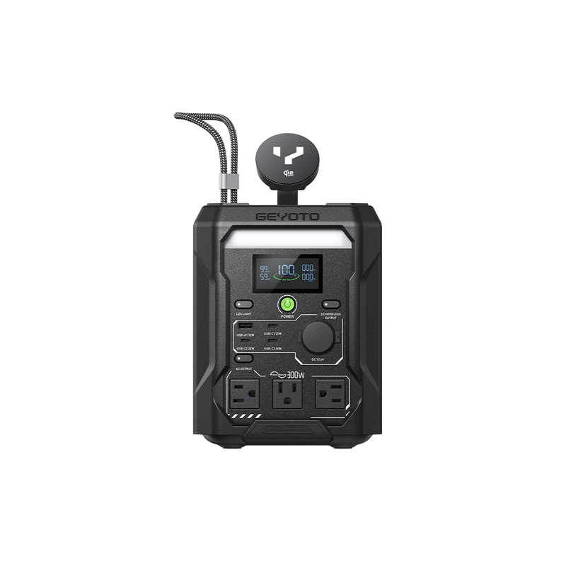Front view of a compact GEYOTO power station with outlets, a display, a carry handle, and a phone charging stand.