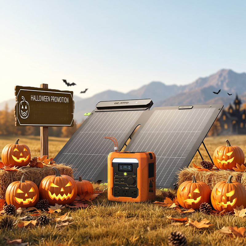Orange GEYOTO power station with an unfolded solar panel among jack-o'-lanterns in a field.