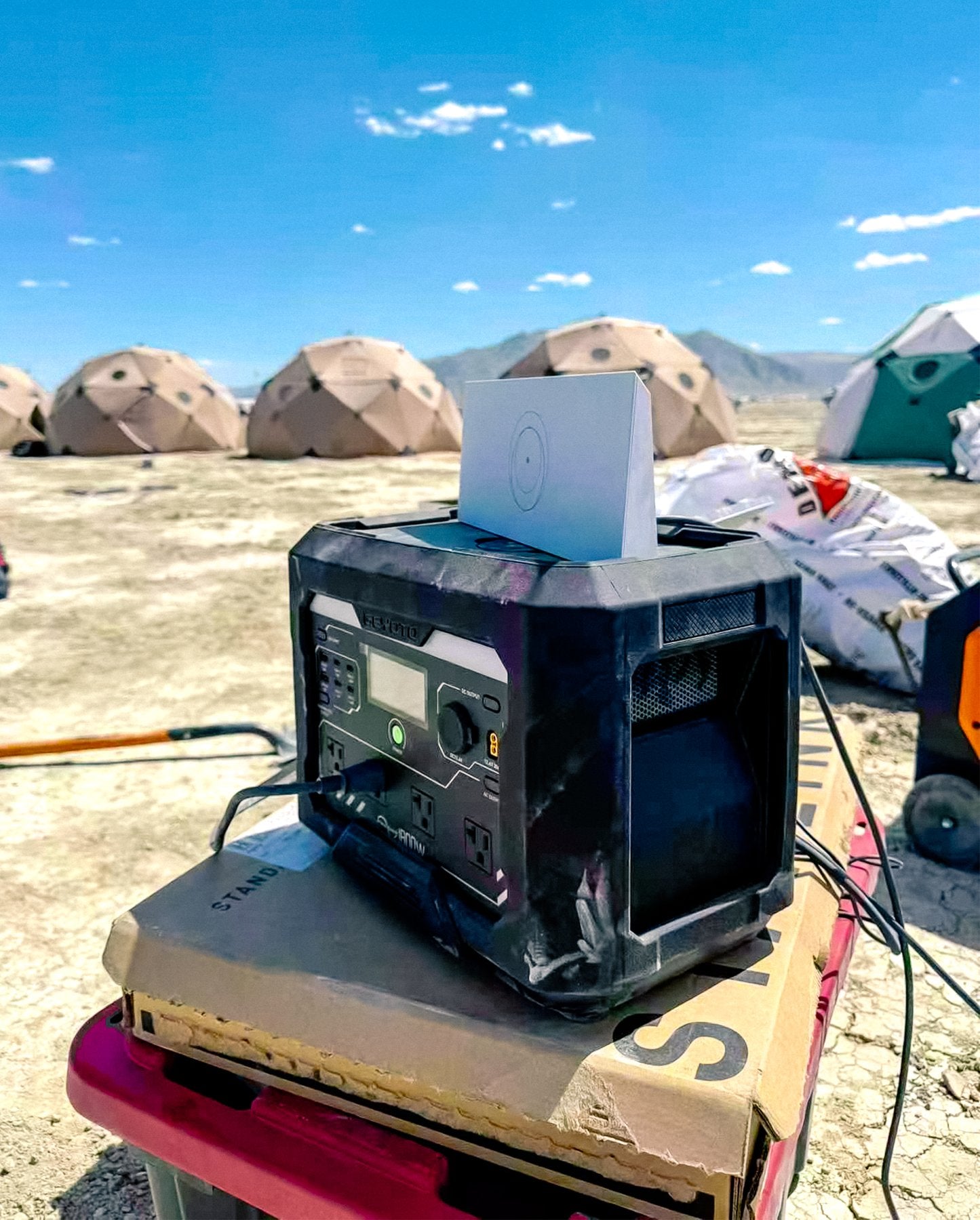 GEYOTO power station with a connected device at camp