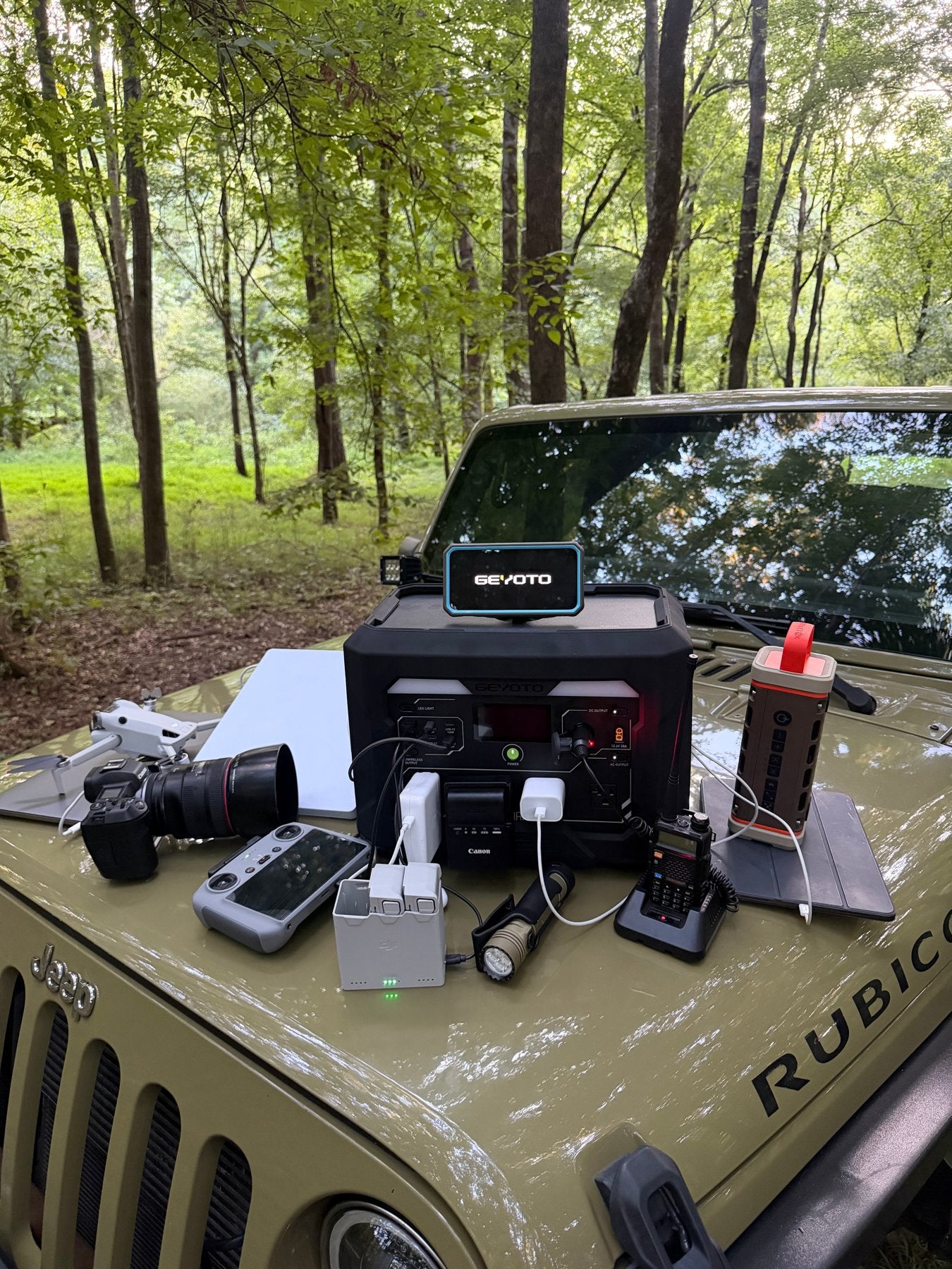 A GEYOTO power station with camera gear and battery chargers