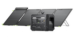 A portable power station with a foldable solar panel array, shown on a plain white background. The power station is black with a digital display screen, and the solar panels are dark gray with small green accent tabs at the corners.